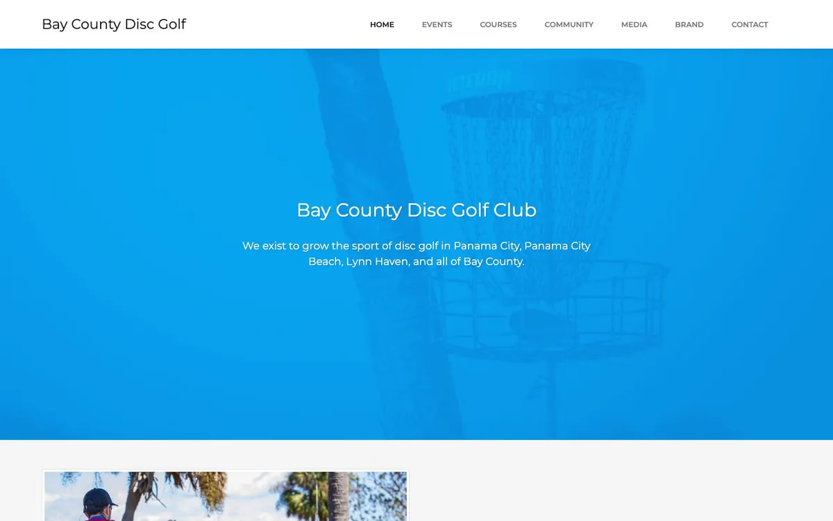 The previous site, 2021 to 2026: a flat blue hero reading Bay County Disc Golf Club with the mission statement, above a values list.