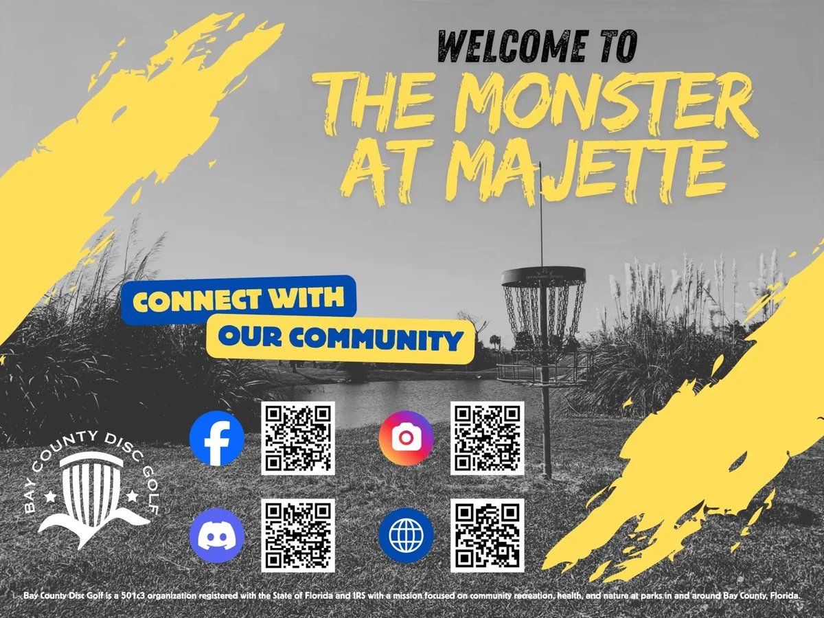 Welcome to the Monster at Majette sign, 2026: a photo of the course with yellow paint strokes and QR codes for Facebook, Instagram, Discord, and the website.